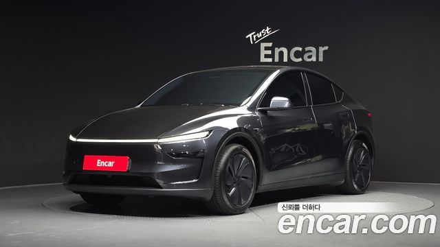 Tesla Model Y 2025 — photo 1