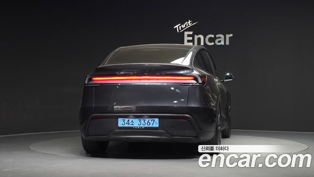 Tesla Model Y 2025 — photo 4