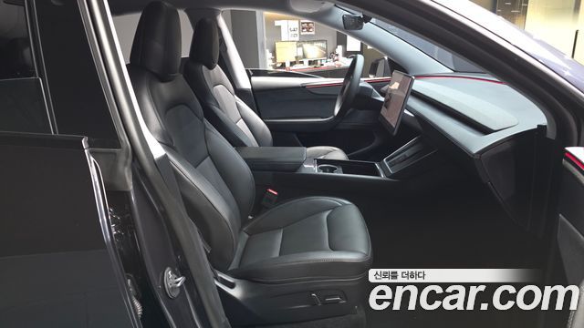 Tesla Model Y 2025 — photo 17