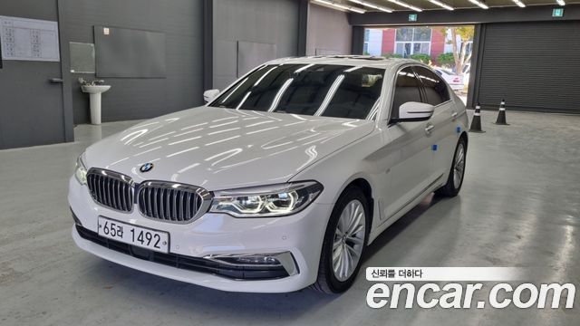 BMW 5-Series 2018 — photo 1