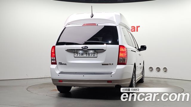 Kia Canival 2013 — photo 4