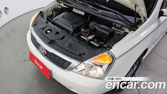 Kia Canival 2013 — photo 6