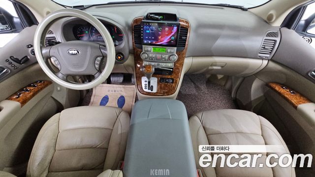 Kia Canival 2013 — photo 7