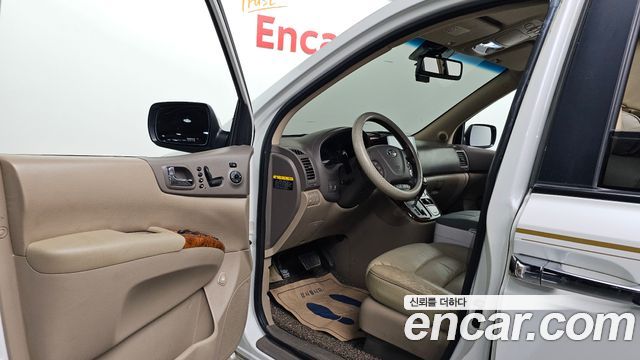 Kia Canival 2013 — photo 10