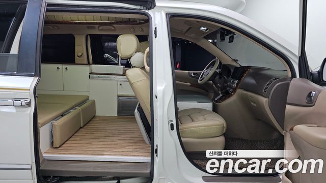 Kia Canival 2013 — photo 11