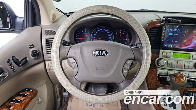 Kia Canival 2013 — photo 14