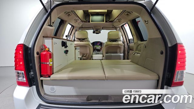 Kia Canival 2013 — photo 19