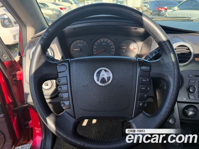 KG Mobility Actyon 2009 — photo 12