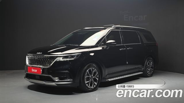 Kia Canival 2023 — photo 1