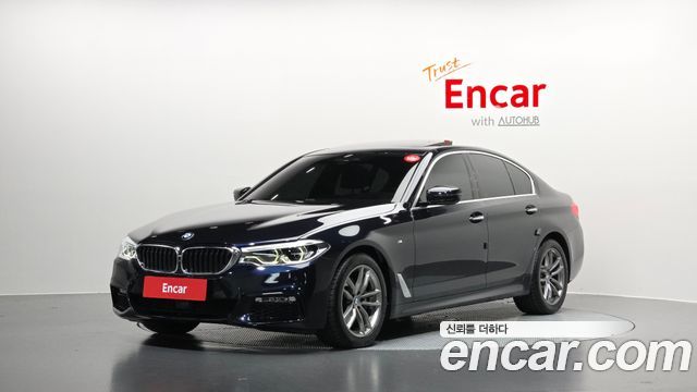 BMW 5-Series 2018 — photo 1