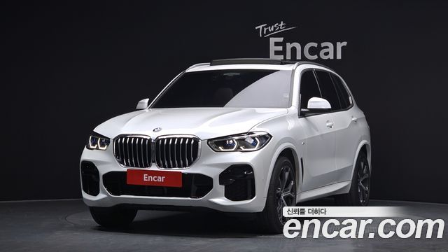 BMW X5 2022 — photo 1