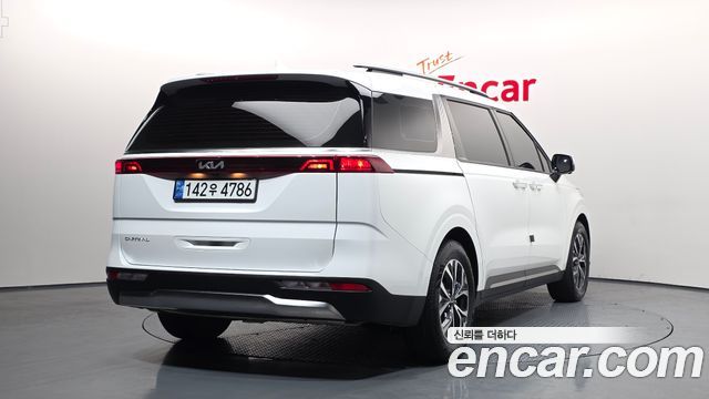 Kia Canival 2023 — photo 2