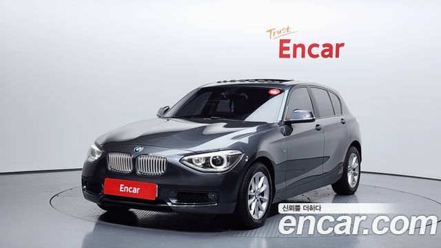 BMW 1-Series 2014 — photo 1