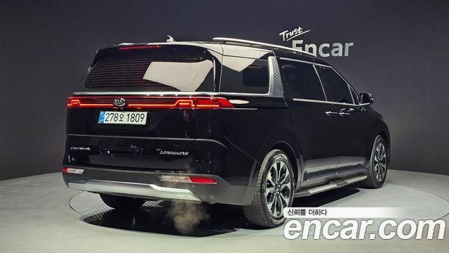 Kia Canival 2021 — photo 2