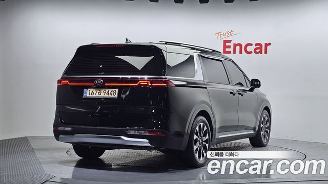 Kia Canival 2021 — photo 2