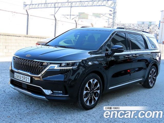 Kia Canival 2021 — photo 2