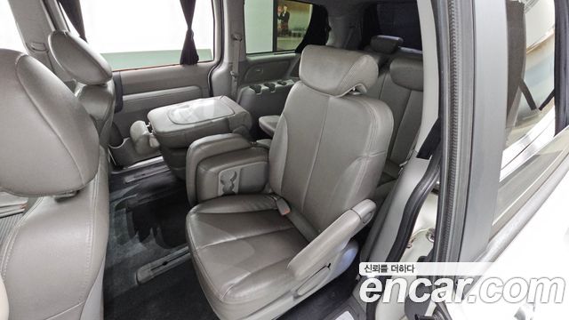 Kia Canival 2014 — photo 12