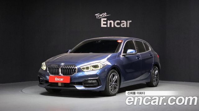 BMW 1-Series 2021 — photo 1