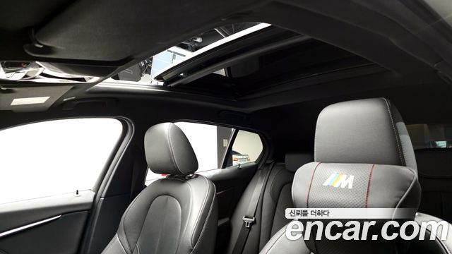 BMW 1-Series 2022 — photo 19