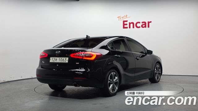 Kia K3 2013 — photo 2