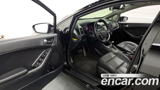 Kia K3 2013 — photo 10