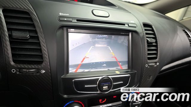 Kia K3 2013 — photo 15