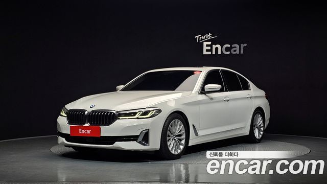BMW 5-Series 2023 — photo 1