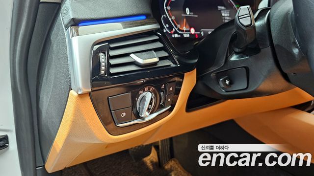 BMW 5-Series 2023 — photo 14