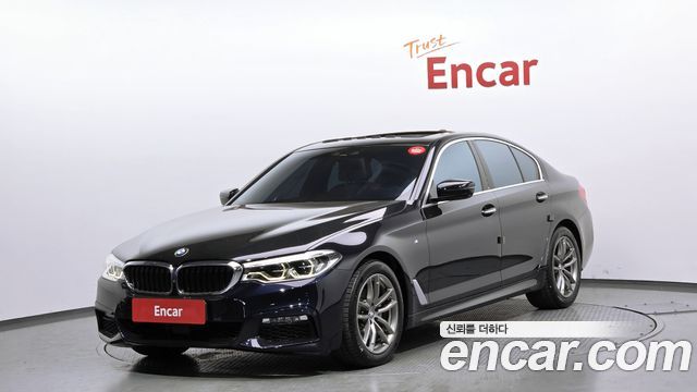 BMW 5-Series 2018 — photo 1