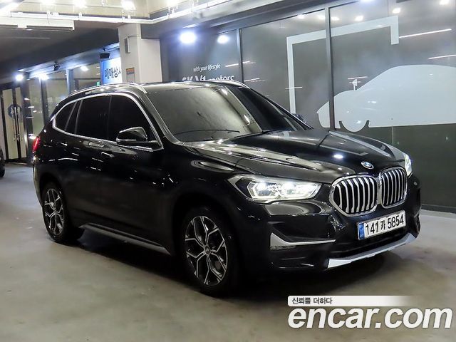 BMW X1 2021 — photo 1