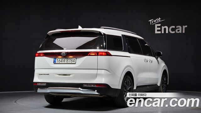 Kia Canival 2021 — photo 2