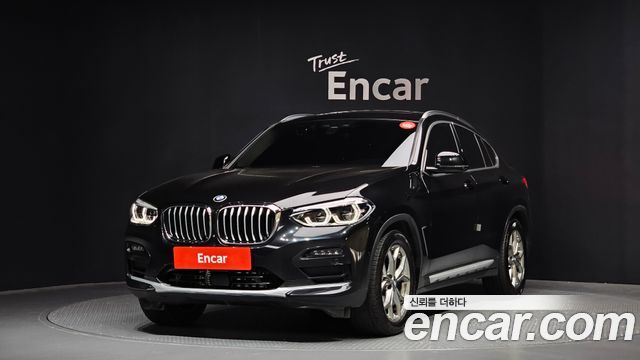 BMW X4 2021 — photo 1