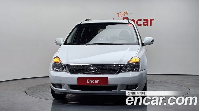 Kia Canival 2012 — photo 3