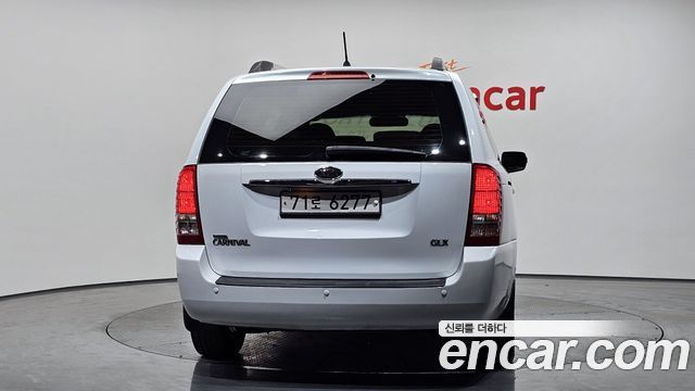 Kia Canival 2012 — photo 4