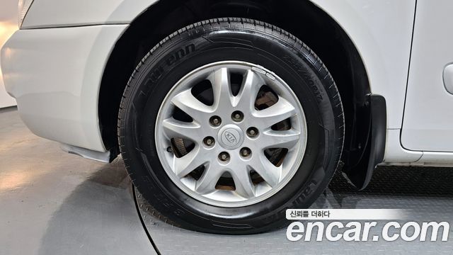 Kia Canival 2012 — photo 5