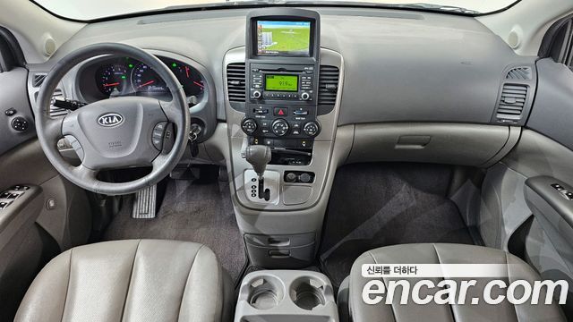 Kia Canival 2012 — photo 7