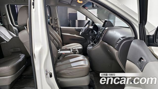 Kia Canival 2012 — photo 10