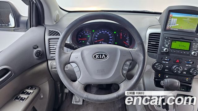 Kia Canival 2012 — photo 13