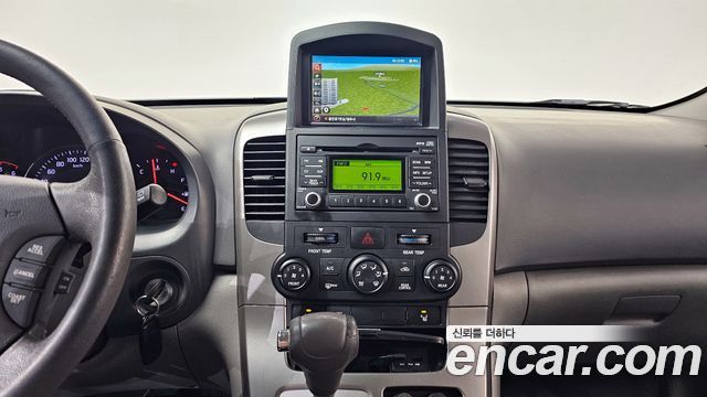 Kia Canival 2012 — photo 14