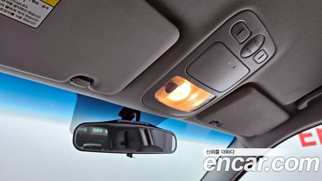 Kia Canival 2012 — photo 16