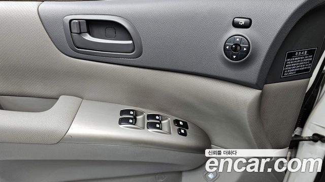 Kia Canival 2012 — photo 18