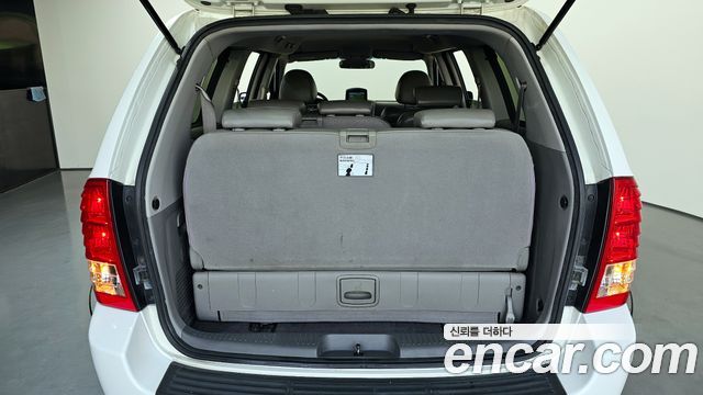 Kia Canival 2012 — photo 20