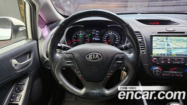 Kia K3 2015 — photo 14