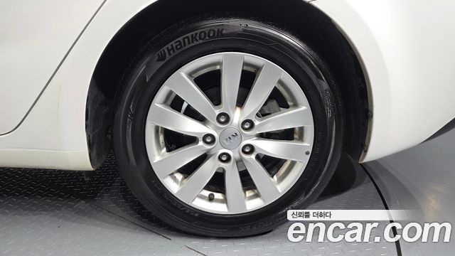 Kia K3 2013 — photo 5