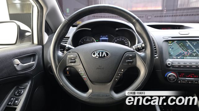 Kia K3 2013 — photo 13