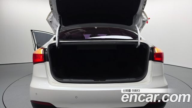 Kia K3 2013 — photo 20