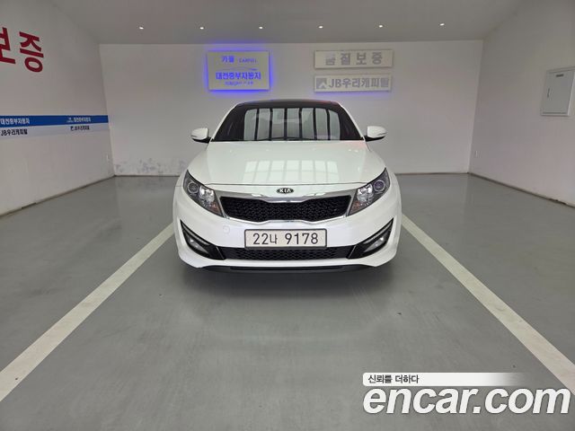 Kia K5 2011 — photo 1
