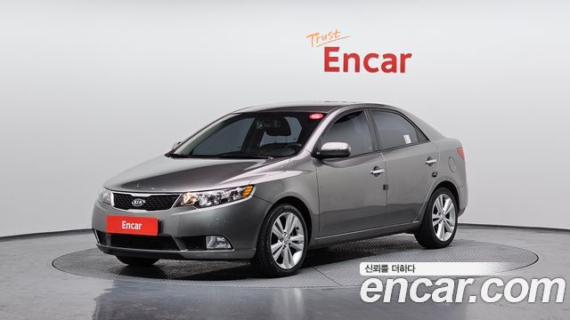 Kia Porte 2011 — photo 1