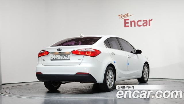 Kia K3 2013 — photo 2