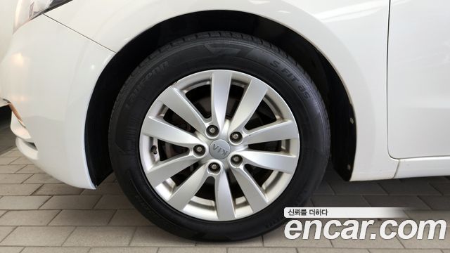 Kia K3 2013 — photo 5
